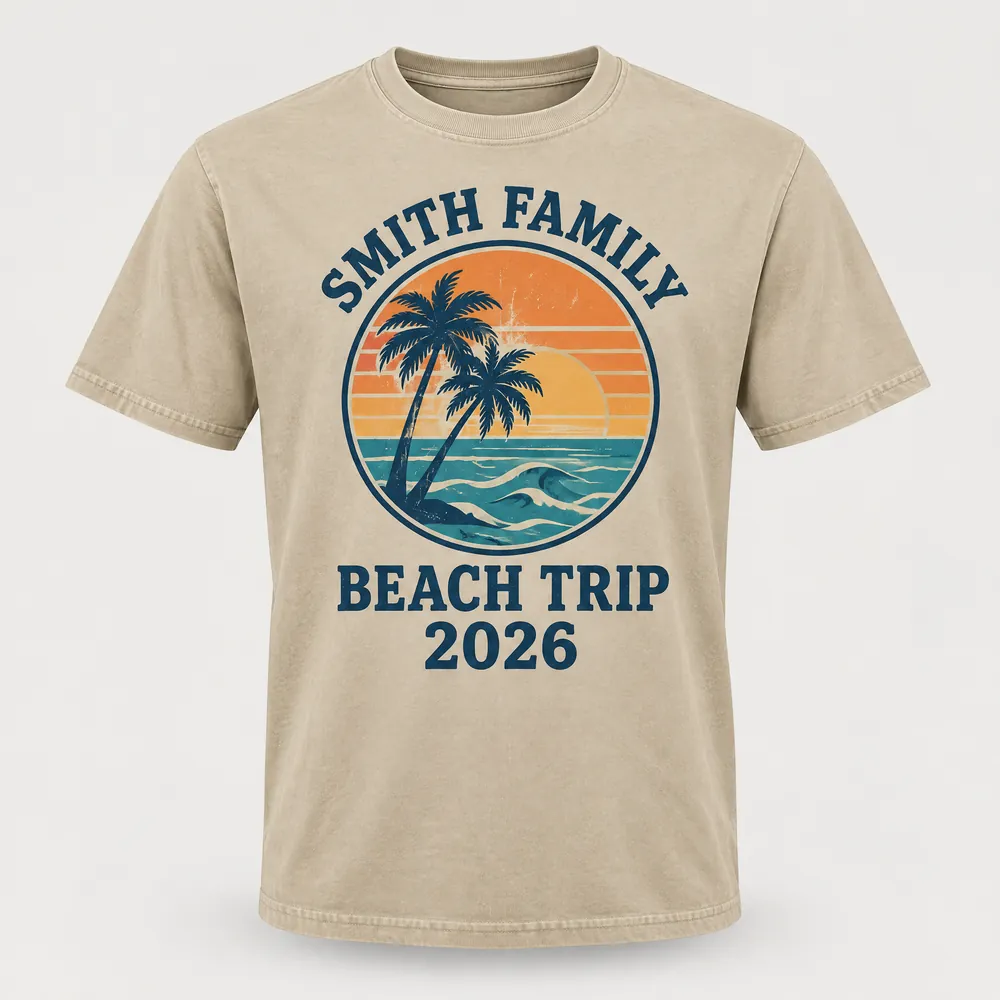 Sand Smith Family Beach Trip tee with a sunset badge