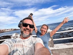 Couple posing together outdoors